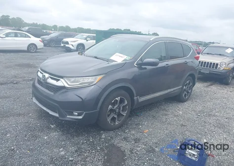2017 Honda Cr-V Touring z USA, uszkodzony, nr VIN 2HKRW2H99HH615018